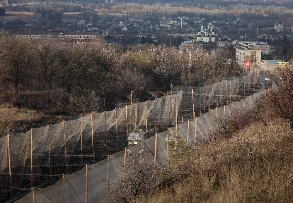 Completed anti-drone netting tunnel over an open highway